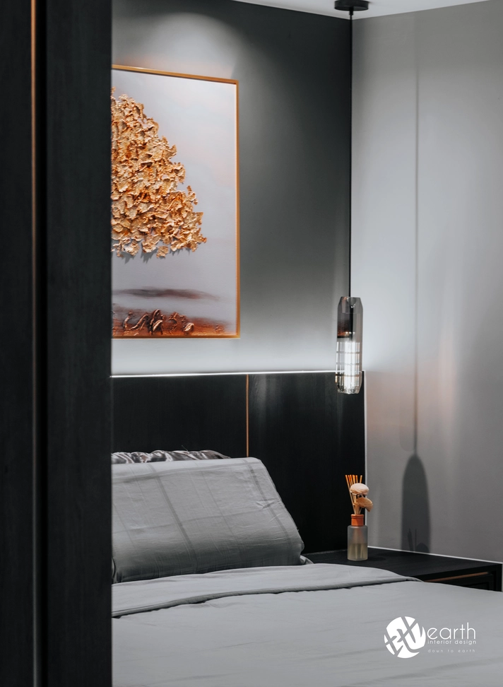 Close-up of bedside lighting in a luxurious black-themed design.