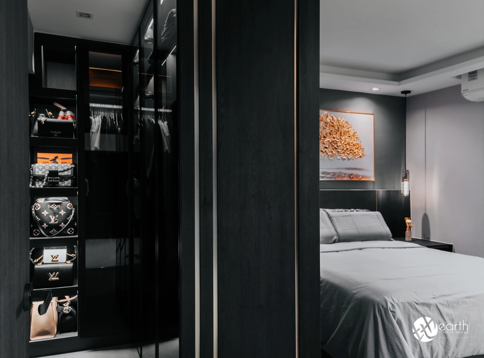 Luxury design with black panel walls and a sleek, modern bed frame.