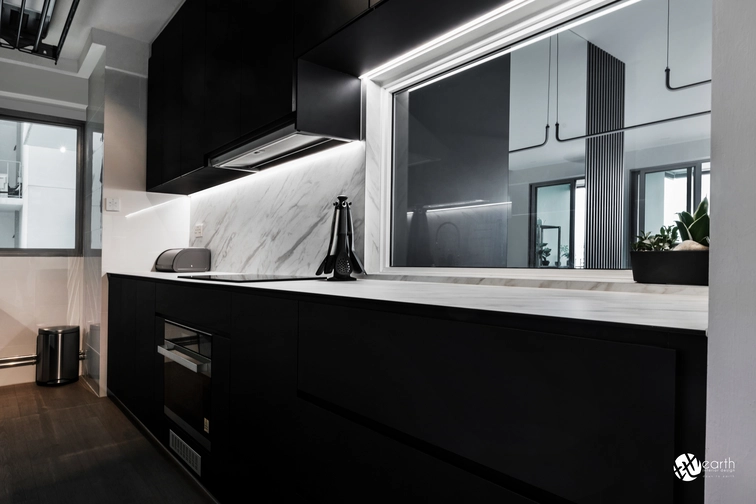 Small kitchen design with black cabinets and a polished marble countertop for a modern aesthetic.