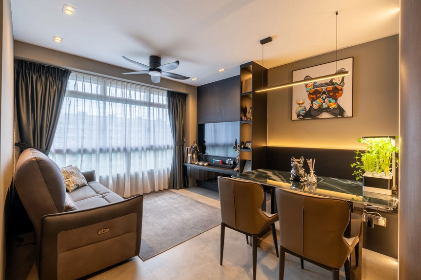 Wide-angle view of a luxurious living room with a cozy sofa, artistic decor, and ambient lighting.